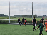 Laatste training S.K.N.W.K. JO11-1JM (partijtje tegen de ouders) van maandag 27 mei 2024 (106/137)